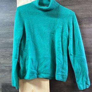Turquoise colored large women’s cashmere turtleneck